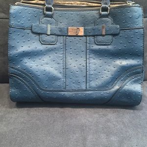 Guess Ostrich Purse It’s Has Two Zippers And Button Up In the Middle